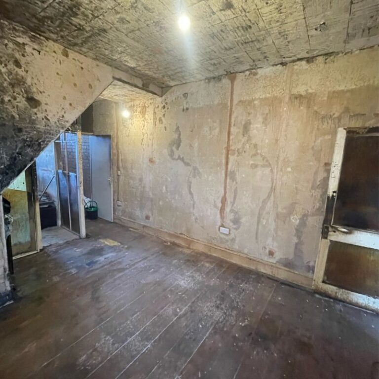 An empty and tidy room after being professionally cleaned after a house fire