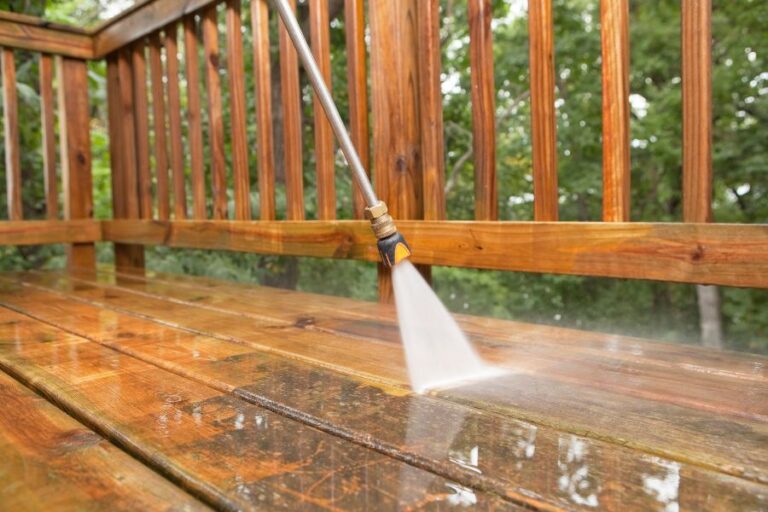 pressure washing a wooden decking