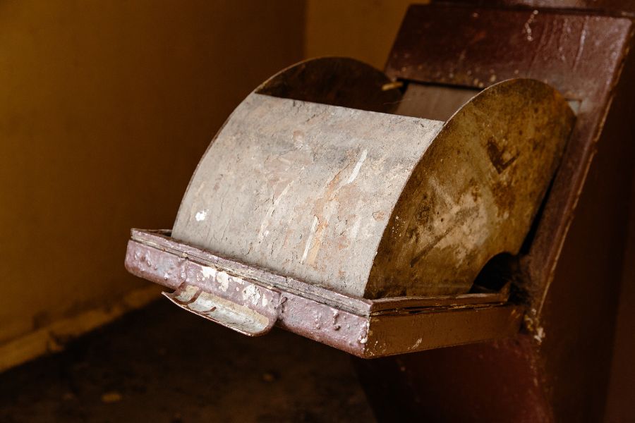 an image of a garbage chute that requires a clean