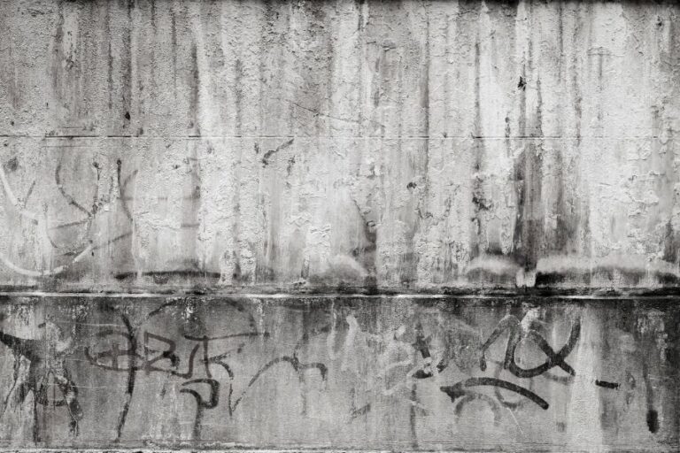 black smudged graffiti on a work building