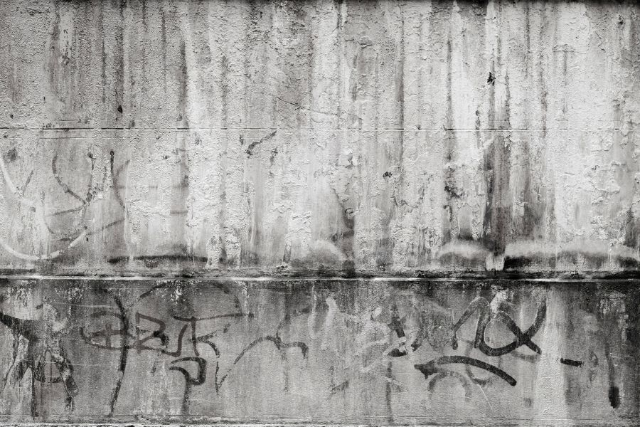 black smudged graffiti on a work building