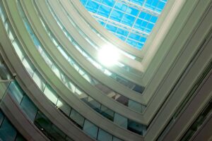 Interior atrium with glass ceiling requiring high access cleaning services