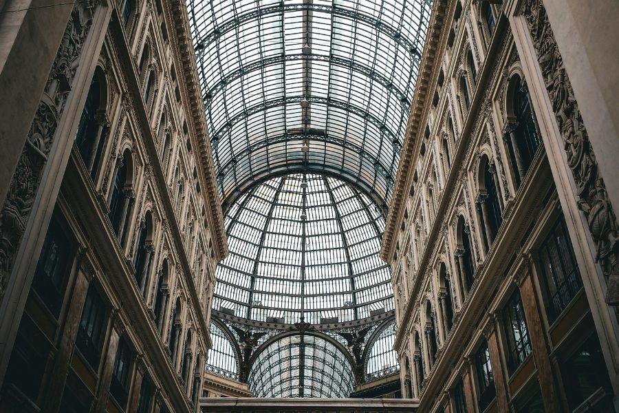 High level atrium glass roof requiring specialist cleaning in a commercial building