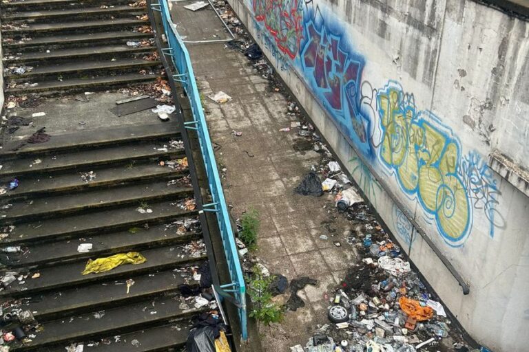 Birmingham city centre underpass staircase and walkway contaminated with waste before needle sweep