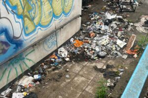 Waste and hazardous debris inside Birmingham city centre underpass before specialist needle sweep